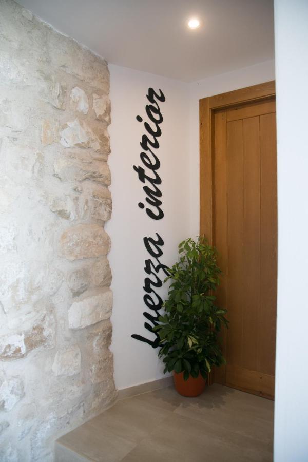 Apartamentos Turisticos La Casa Vieja 萨比奥特 外观 照片